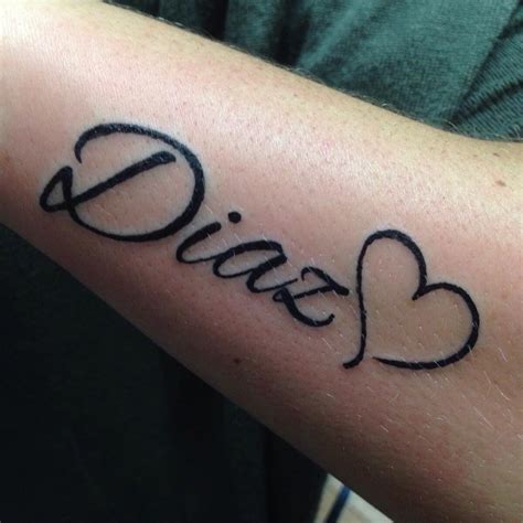 tattoo names with hearts|tattoo heart with name designs.